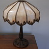 old slag glass lamp need help with any info on this item  and value?