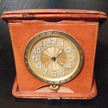 Antique Swiss made, 8 day, travel clock in leather case