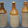 ---Large size Tan and White stone ware beer bottles---