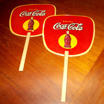 A pair of 1930s Coca-Cola fans