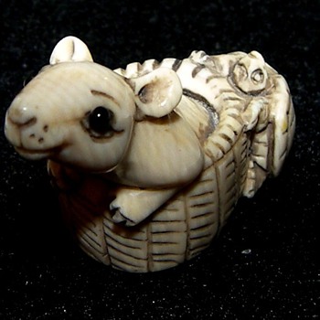 Three Netsuke and a Brush Rest