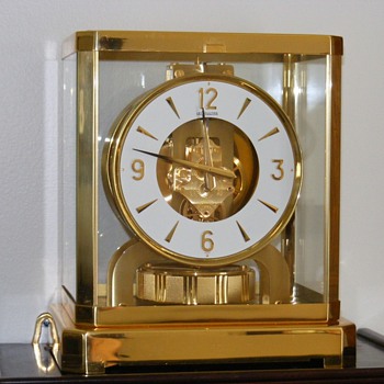 An amazing clock - almost perpetual motion (VERY close) - Clocks