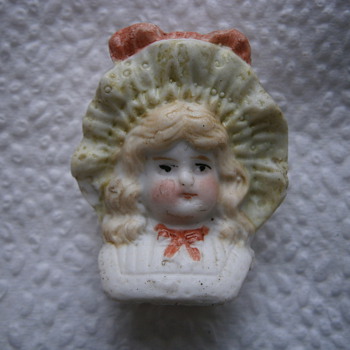 Old doll heads