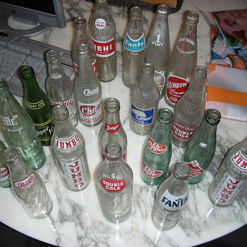 collection of old soda bottles - Bottles