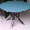 Who designed this Herman Miller table??
