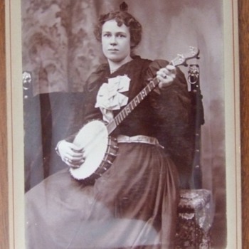 Cabinet card of a woman with her Banjo c. 1890