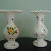 Does anyone know who makes these vases?