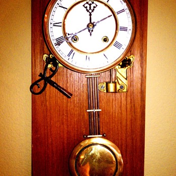 Oma's clock - blown off the wall in WWII- wondering how old it is - Clocks