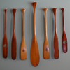 Some salesman's sample and other native-made miniature paddles