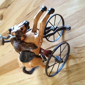 Three wheel bike with wooden horse??