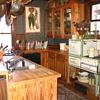 Little old gas stove on legs - a "summer kitchen?"