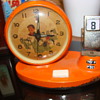 Day Date Calender Art Deco metal Alarm clock with Waving Hand  & Airplane ???