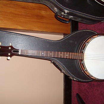 4 string banjo - Guitars