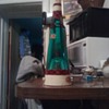 liquor bottle with music box iin the bottom