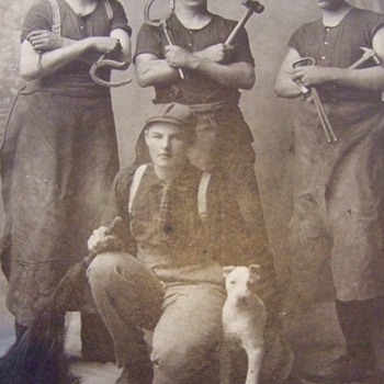 Photo of Blacksmiths with apprentice and dog  c. 1895 - Photographs