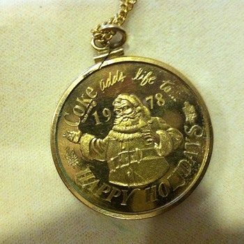 1978 coca cola Santa and present pendent