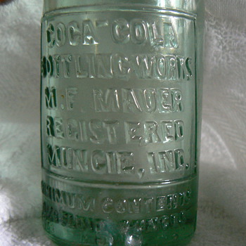 Early Coke bottle - Coca-Cola