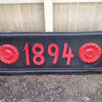 "1894" metal sign