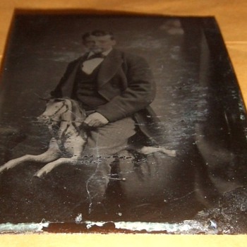 Tintype of man on carved rocking horse - Photographs