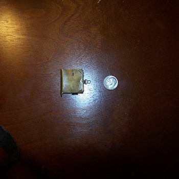 Victorian postage stamp sized brass booklet containing nude photos - Photographs