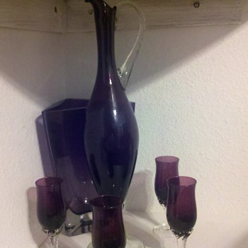 purple glass port decanter with 4 glasses