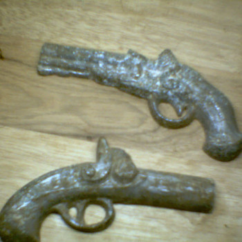 I found these with my metal detector 12" down. I'll appreciate your help!