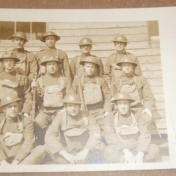 WW1 Doughboys with camo and insignia painted helmets