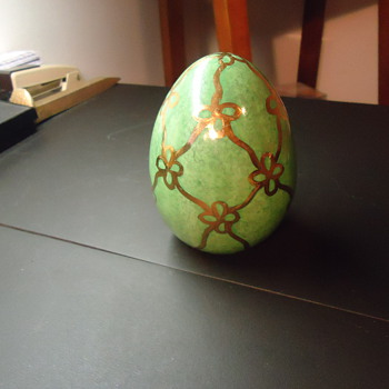 a golden green egg