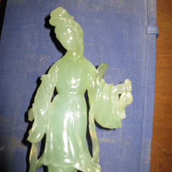 Japanese Kwan yin statue  holding two fish