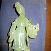 Japanese Kwan yin statue  holding two fish