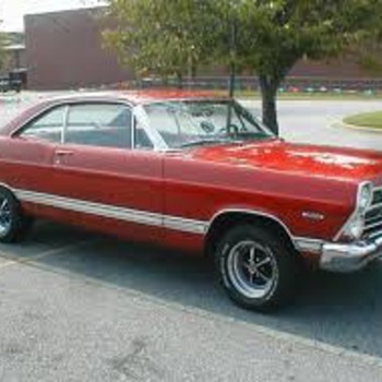 full size road billboard of a ford fairlane.... 67 i believe