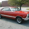 full size road billboard of a ford fairlane.... 67 i believe