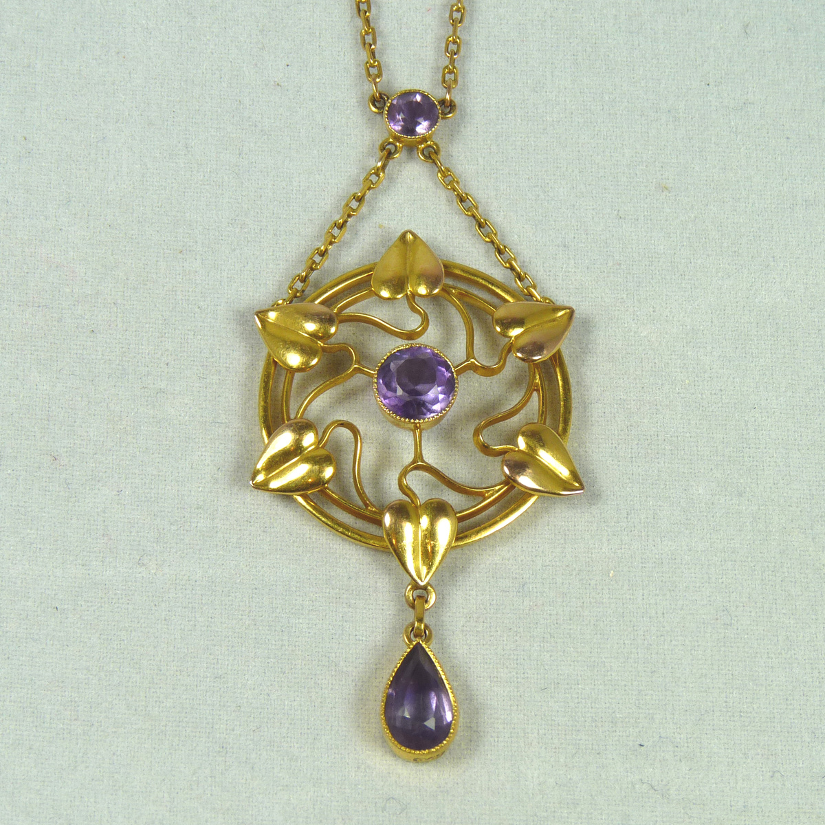 Four Liberty & Co Art Nouveau Jewellery Items by Archibald Knox and