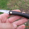 Pre-WWII era D.R.G.M. German pocket knife with wood handles.