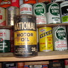 old and new  oil can 