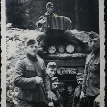 cosy in the wartime, advertising the enemy - Coca-Cola