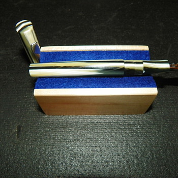 1) This is a Visconti Portofino L.E. #26 of 150 c.2001 - Pens