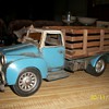 metal truck with lots of petina!! very old! it measures 6"x16" wooden box on back (no markings