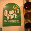 Quaker State sign and a 60"s era stop light in the garage...  You'll know it's our house!