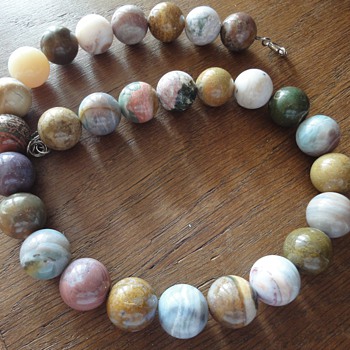 Ornate necklace of round beads