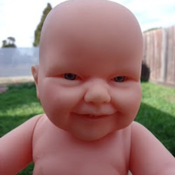 goofy looking doll - Dolls