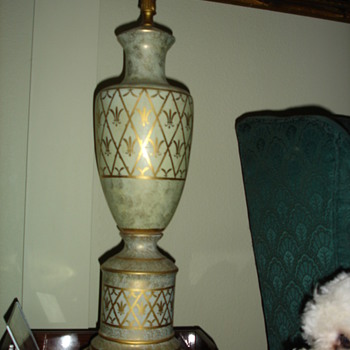 Green lamp with gold paint is beautiful I think is from Italy