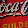Here is my early 30s Long "C" Coca Cola tin sign