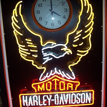 Old Harley clock sign