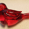 Red glass bird that sits????....
