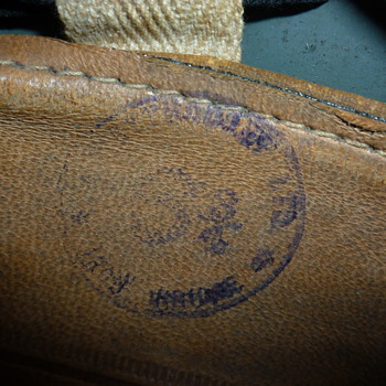 for tinlid, close up photo of stamp in Zukerman helmet - Military and Wartime
