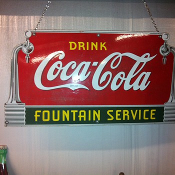 Coca Cola sign from 39, Buick wheels from the 20's,Toms peanut cabinet from 50's - Coca-Cola
