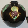 Glazed pot with George Washington on two sides, approx 8" tall. Small repair on lip. Any help on ID would be appreciated