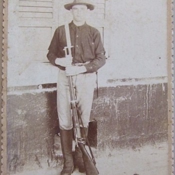 Cabinet card of Spanish American War soldier with his Krag Rifle - Photographs