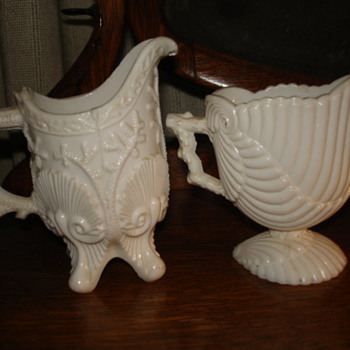 Pretty Slip mold Milk Glass Creamers- Anyone know who made these?